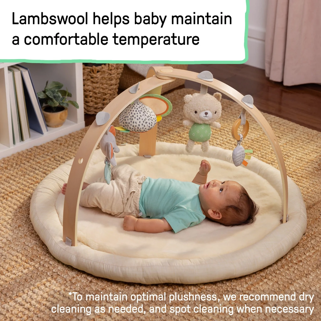 ingenuitytm-every-seasontm-plush-lambswool-play-gym-3.webp